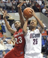UConn's Michala Johnson takes the ball to the basket against Fairfield's Taryn Johnson 