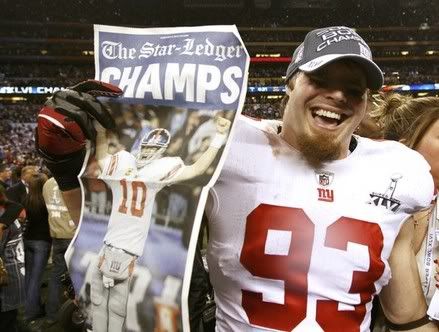 New York Giants middle linebacker Chase Blackburn celebrates after the Giants defeated the New England Patriots in the NFL Super Bowl XLVI football game in Indianapolis, Indiana, February 5, 2012.