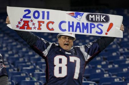 A New England Patriots fan celebrates after his team defeated the Baltimore Ravens in the NFL AFC Championship football game in Foxborough, Massachusetts, January 22, 2012.