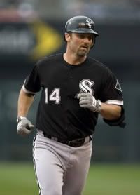 Paul Konerko #14 of the Chicago White Sox rounds third after hitting a home run in the seventh inning during a game against the Kansas City Royals at Kauffman Stadium on September 18, 2011 in Kansas City, Missouri.