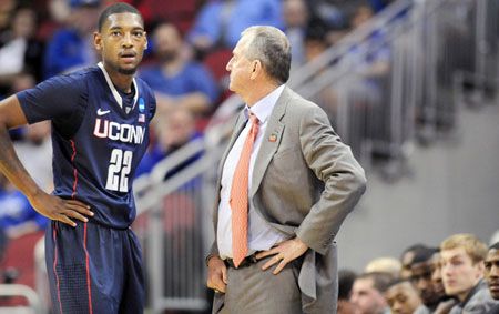 An exasperated Jim Calhoun looks at Roscoe Smith during the first half of a 77-64 loss to Iowa State Thursday, March 15, 2012, to end their season in the second round of the NCAA tournament at the KFC Yum! Center in Louisville, Kentucky.