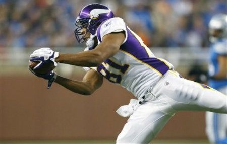 Minnesota Vikings tight end Visanthe Shiancoe (81) makes a reception in the first quarter of an NFL football game against the Minnesota Vikings in Detroit, on Sunday, Dec. 11, 2011.