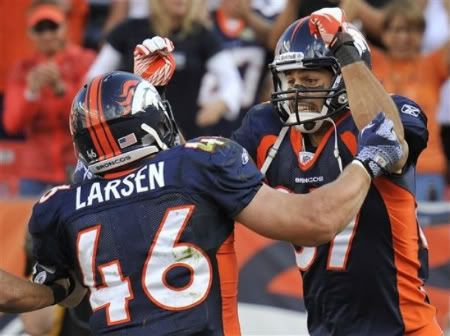 Denver Broncos wide receiver Eric Decker (87) celebrates with fullback Spencer Larsen (46) after scoring a touchdown in the fourth quarter against the Cincinnati Bengals during an NFL football game on Sunday, Sept. 18, 2011, in Denver.