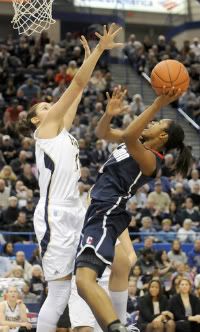 UConn's Tiffany Hayes shoots over Notre Dame's Natalie Achonwa in the Big East championship game at the XL Center in Hartford Tuesday night.