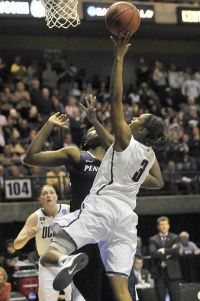 UConn's Tiffany Hayes shoots for two of her 10 points over Penn State's Nikki Greene in the second half of their NCAA Sweet 16 game at the Ryan Center at the University of Rhode Island.