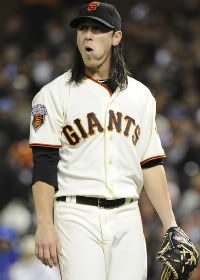 Tim Lincecum #55 of the San Francisco Giants looks on after being taken out by manager Bruce Bochy against the Chicago Cubs in the seventh inning during an MLB baseball game at AT&T Park August 29, 2011 in San Francisco, California. The Cubs won the game 6-0.