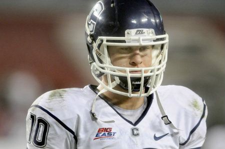  Connecticut Huskies quarterback Chandler Whitmer walks back to the locker room after being defeated by USF, 13-6, at Raymond James Stadium Saturday night. 