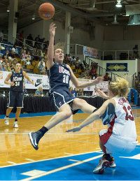 UConn freshman Breanna Stewart, left, and Marist's Emma O'Connor collide at the Paradise Jam Friday night in the Virgin Islands