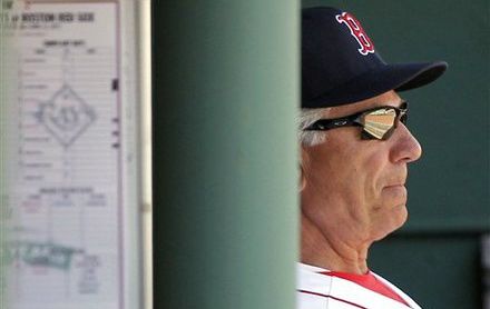 Boston Red Sox manager Bobby Valentine looks out of from the dugout during their 1-0 loss to the Tampa Bay Rays in a baseball game at Fenway Park in Boston Monday, April 16, 2012. Valentine questioned Kevin Youkilis' commitment to the game in his weekly television interview, then apologized to the Boston third baseman on Monday.