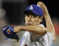 Los Angeles Dodgers pitcher Vicente Padilla throws in the ninth inning of a baseball game against the Pittsburgh Pirates in Pittsburgh Wednesday, May 11, 2011. The Dodgers won 2-0 with Padilla getting his third save.