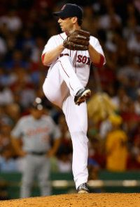 Craig Breslow #32 of the Boston Red Sox pitches against the Detroit Tigers during the game on August 1, 2012 at Fenway Park in Boston, Massachusetts.