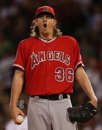 Jered Weaver #36 of the Los Angeles Angels reacts after giving up a run in the fourth inning against the Boston Red Sox at Fenway Park on August 22, 2012 in Boston, Massachusetts. 