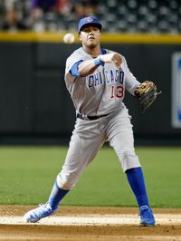  Shortstop Starlin Castro #13 of the Chicago Cubs throws to first on a ground ball out against the Arizona Diamondbacks during a MLB game at Chase Field on September 30, 2012 in Phoenix, Arizona. 