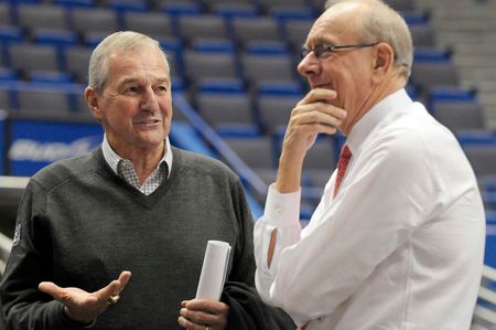 Former UConn head coach Jim Calhoun and Syracuse head coach Jim Boeheim before the final regular season game between the two Big East teams at the XL Center Wednesday night. 