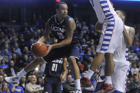  UConn's Shabazz Napier goes airborne looking for a teammate against DePaul at the Allstate Arena Saturday night. 