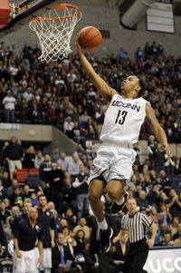 UConn guard Shabazz Napier goes in for two of his game-high 24 points as the Huskies came back for a 69-64 victory in OT against USF at Gampel Pavilion Sunday afternoon