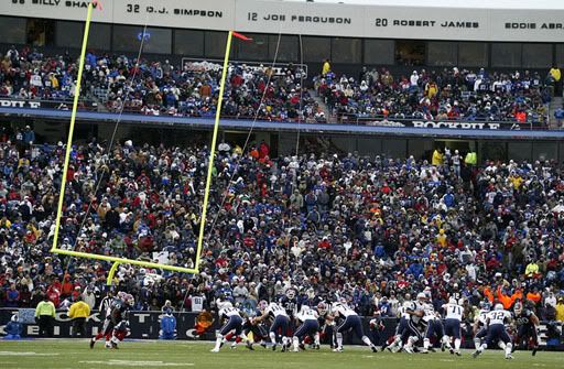 The goalpost tips after being blown by high winds during the game between the Buffalo Bills and the New England Patriots at Ralph Wilson Stadium - Getty Images