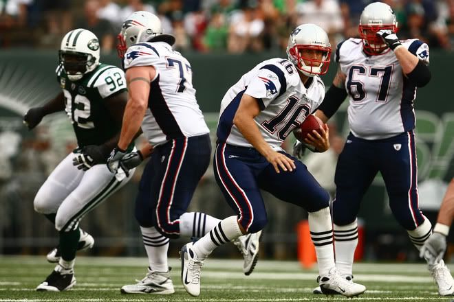 Cassel runs for a gain against the Jets.  Getty Photo.