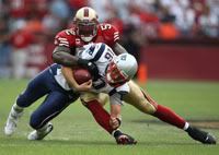 Niners LB Patrick Willis notches one of the five San Francisco sacks on the day.  Getty Photo.  
