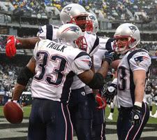 Kevin Faulk (33) of the New England Patriots celebrates with teammates after scoring a touchdown against the Oakland Raiders during an NFL game on December 14, 2008 at the Oakland-Alameda County Coliseum - Getty Images