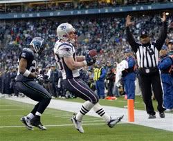  New England Patriots wide receiver Wes Welker scores on a two-point conversion ahead of Seattle Seahawks cornerback Josh Wilson in the fourth quarter of an NFL football game, Sunday, Dec. 7, 2008, at Qwest Field in Seattle - AP Photo