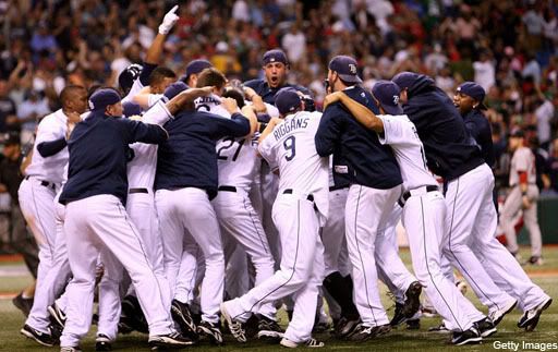 The Rays celebrate their 9-8 win over the Red Sox in Game 2 of the ALCS.