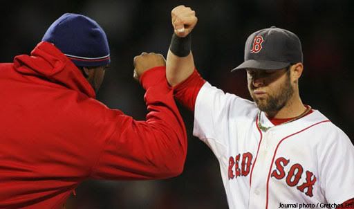 David Ortiz and Dustin Pedroia congratulate each other after the game.