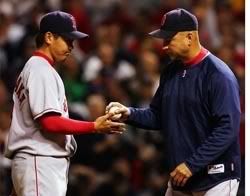 Terry Francona taking the ball from Dice-K