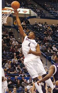 Jeff Adrien going up for 2 - AP Photo