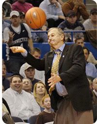Jim Calhoun showing his volleyball form - Courant Photo