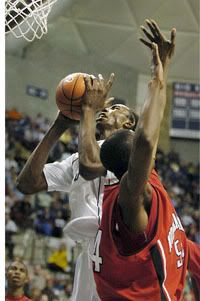 Hasheem Thabeet goes for 2 of his 13 - Courant Photo