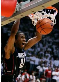 Stanley Robinson dunks - AP Photo