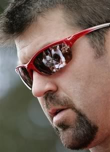 Boston Red Sox catcher Jason Varitek looks at fans as they seek his autograph at baseball spring training on the first day of pitchers and catchers workout, in Fort Myers, Fla. , Saturday, Feb. 20, 2010 - AP Photo