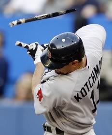Boston Red Sox batter Casey Kotchman breaks his bat on a foul ball against the Toronto Blue Jays during the second inning of their MLB American League baseball game in Toronto August 19, 2009 - Reuters