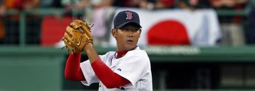 With support from fans behind the bullpen, Sox pitcher Daisuke Matsuzaka allowed no runs on three hits, while walking three and striking out five. - Jim Davis/Boston Globe