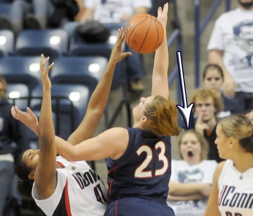 UConn's Kaili McLaren steals the ball from Richmond's Katie Holzer and tips it to Meghan Gardler, right, during the second half Saturday night at Gampel Pavilion. McLaren had four points, four assists and two rebounds in 22 minutes - Patrick Raycroft/Hartford Courant