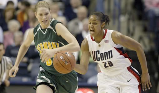 Maya Moore gets out ahead of Vermont's Alissa Sheftic on a fastbreak in the first half - Michael McAndrews/Hartford Courant