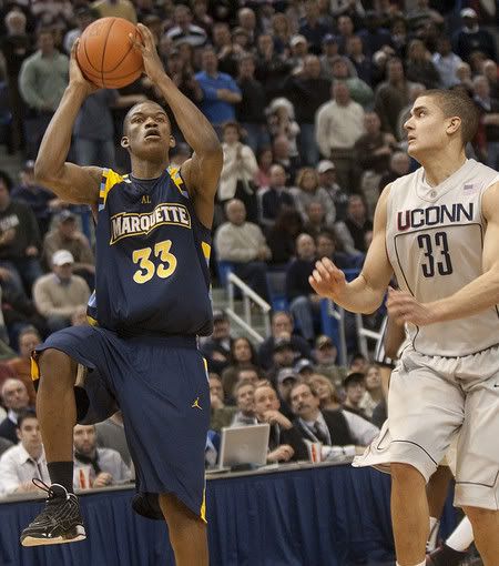 Marquette's Jimmy Butler, left, shoots the game-winning basket as UConn's Gavin Edwards, right, defends during the closing seconds of the second half of Marquette's 70-68 win at the XL Center in Hartford on Saturday, Jan. 30, 2010 - AP Photo