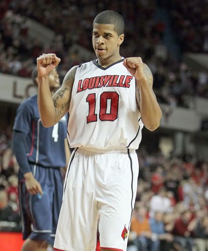 Edgar Sosa #10 of the Louisville Cardinals celebrates during the Big East Conference game against the Connecticut Huskies on February 1, 2010 at Freedom Hall in Louisville, Kentucky. Louisville won 82-69 - Getty Images