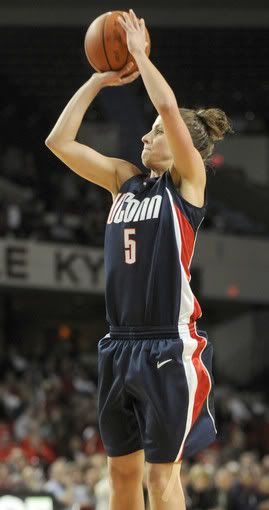 Caroline Doty fires up a three during the first half against Louisville at Freedom Hall. Doty was three for three from outside for nine of her 11 points in UConn's 84-38 win over the Cardinals - Cloe Poisson/Hartford Courant