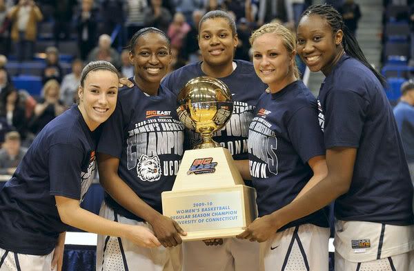 From left, UConn seniors Jacquie Fernandes, Kalana Greene, Kaili McLaren, Meghan Gardler and Tina Charles hold the Big East Regular Season Championship trophy after the Huskies' 84-62 win over Georgetown on Senior Day at the XL Center in Hartford (Jessica Hill/AP Photo)