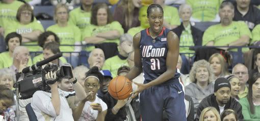 UConn senior center Tina Charles, tries to inbound the ball moments after grabbing a rebound that made her the all time rebound leader at UConn breaking Rebecca Lobo's career rebounding record - Richard Messina/Hartford Courant