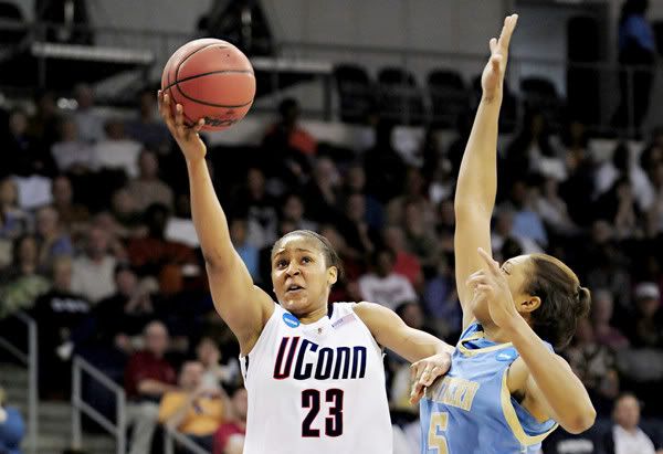 UConn's Maya Moore goes up against Southern's Jamie Floyd during the first round of the women's basketball NCAA Tournament at the Ted Constant Convocation Center at Old Dominion University in Norfolk, Va. March 21, 2010 (Bettina Hansen/Hartford Courant)