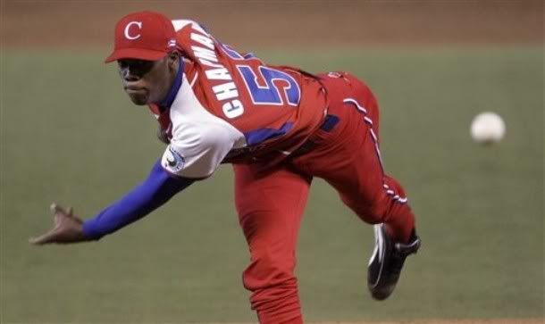 Cuba's Aroldis Chapman pitches in the first inning of a World Baseball Classic game with Australia in Mexico City, Tuesday, March 10, 2009. - AP Photo