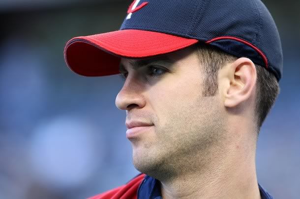 Joe Mauer #7 of the Minnesota Twins looks on during batting practice before Game One of the ALDS against the New York Yankees during the 2009 MLB Playoffs at Yankee Stadium on October 7, 2009 in the Bronx borough of New York City - Getty Images
