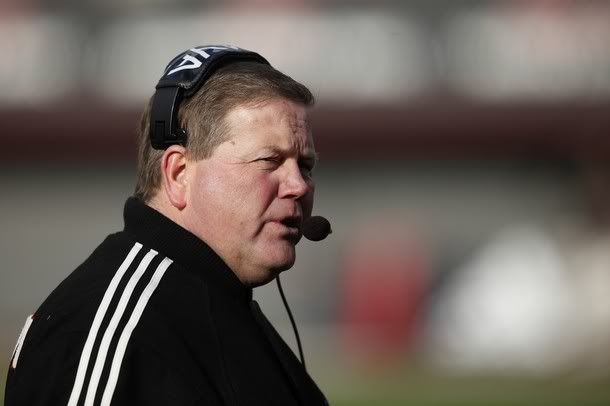 Head coach Brian Kelly of the Cincinnati Bearcats looks on against the Illinois Fighting Illini at Nippert Stadium on November 27, 2009 in Cincinnati, Ohio. The Bearcats won 49-36 to remain unbeaten - Getty Images