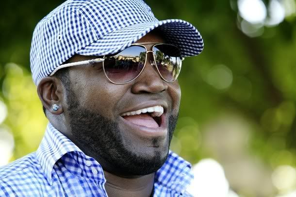 Boston Red Sox David Ortiz smiles while attending a gift donation for children in Santo Domingo January 4, 2010. Ortiz, whose foundation, the David Ortiz Children's Fund, helps children with limited financial resources to be operated on by specialists from Heart Care Dominicana, an organization which helps poor and indigent children suffering from heart disease - Reuters Pictures