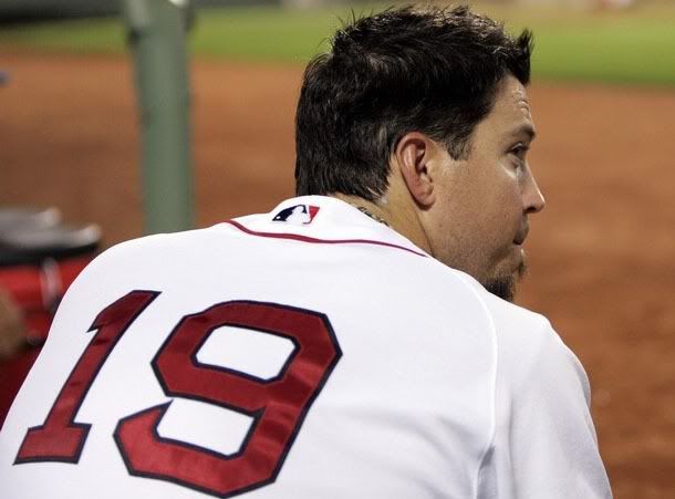 Boston Red Sox starting pitcher Josh Beckett looks on from the dugout after being taken out of the game against the Oakland Athletics during the eighth inning of their MLB American League baseball game at Fenway Park in Boston, Massachusetts July 27, 2009. - Reuters Photo