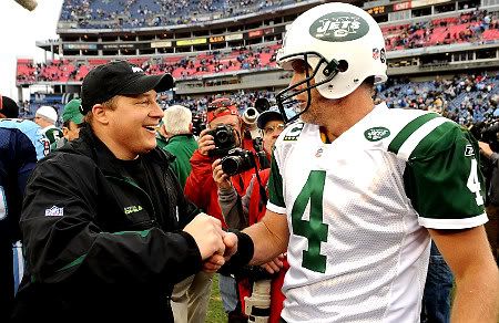 Eric Mangini and Brett Favre - AP Photo