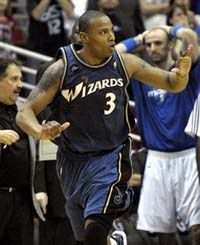 Washington Wizards forward Caron Butler runs back up the court after hitting the game-winning basket with 4.6 seconds left in the second half of an NBA basketball game against the Orlando Magic in Orlando, Fla. , Friday, Feb. 5, 2010. The Wizards won 92-91. (AP Photo)